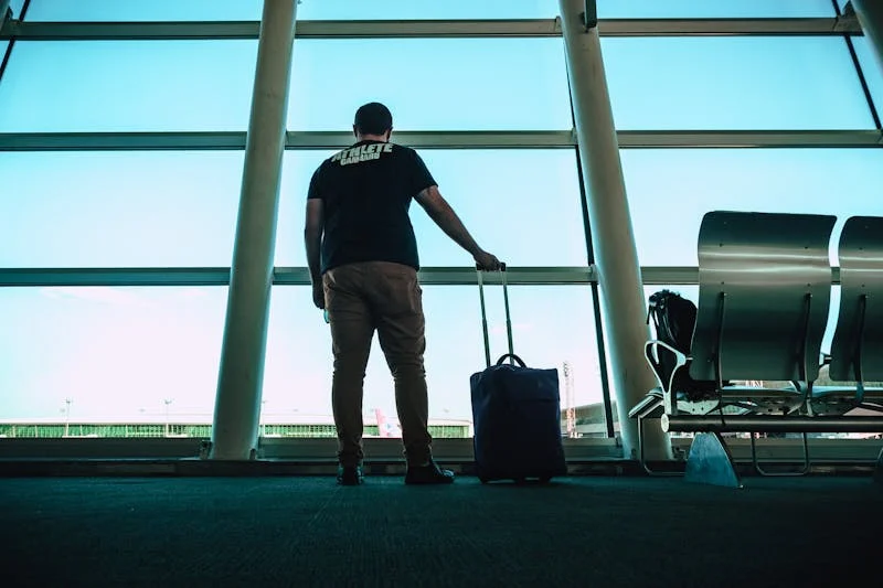 man with carry on bag