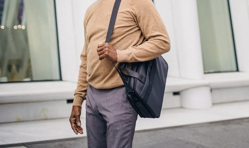 man with carry-on bag